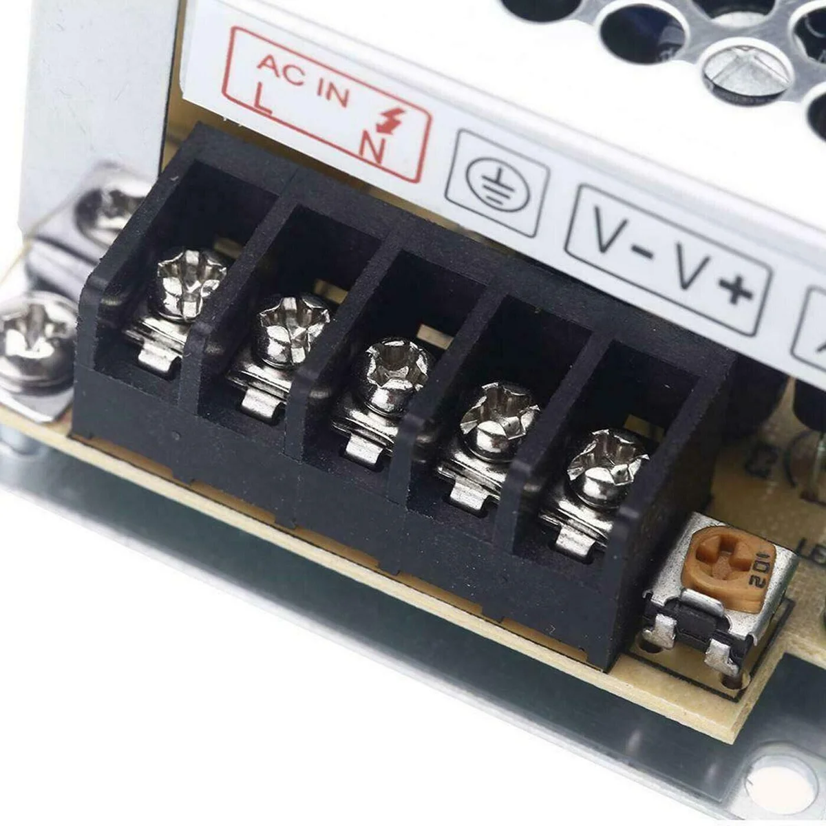 12V LED power supply in a compact metal housing with screw terminals and honeycomb cooling fan