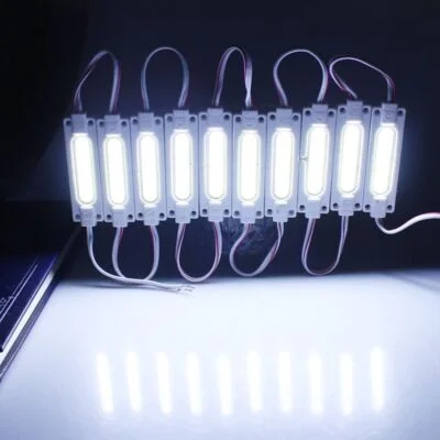 COB LED module 70mm long, 19mm wide, 120 lumens, IP65 waterproof, double‑sided adhesive, 160° beam for sign backlighting.