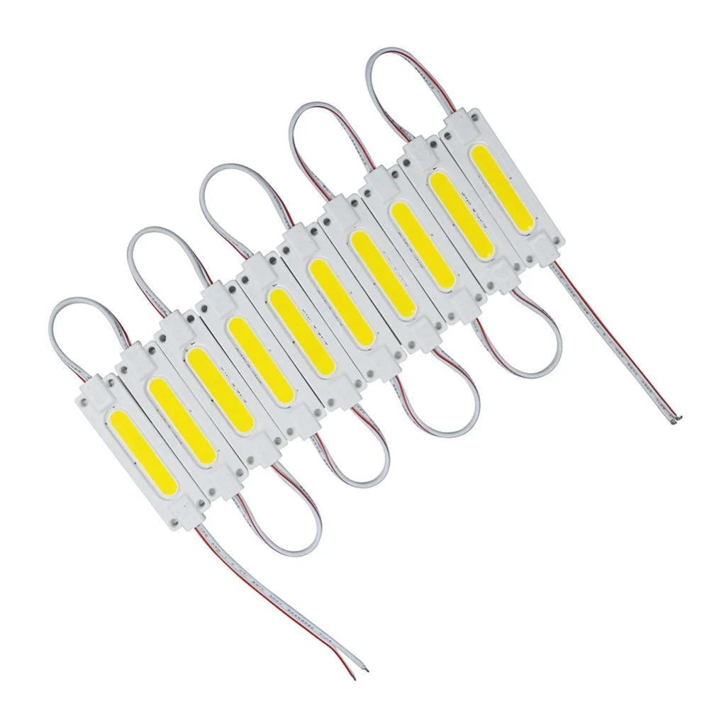 Waterproof LED module with cool white light, adhesive backing, aluminium PCB, 70×19×5 mm compact strip.