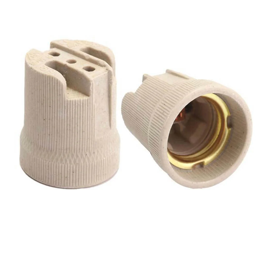 Cylindrical E27 porcelain lamp holder socket, white ceramic with textured ribs, 5cm tall, 3.5cm wide.