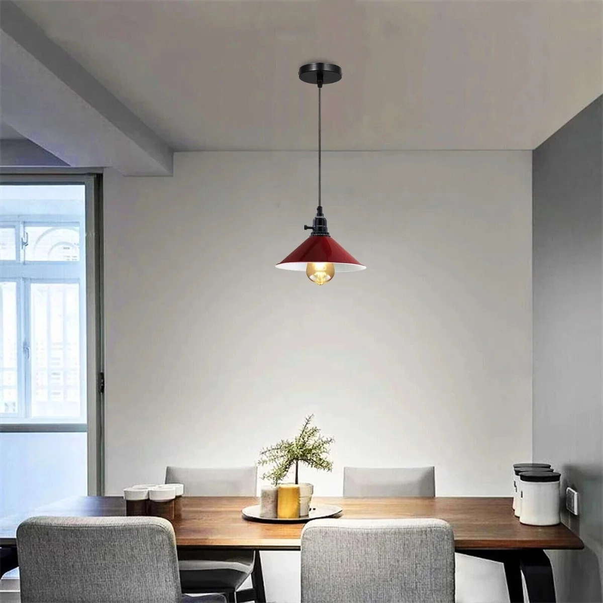 Red hanging pendant light with conical shade, black adjustable fabric cord, industrial style, featuring an E27 socket pendant.