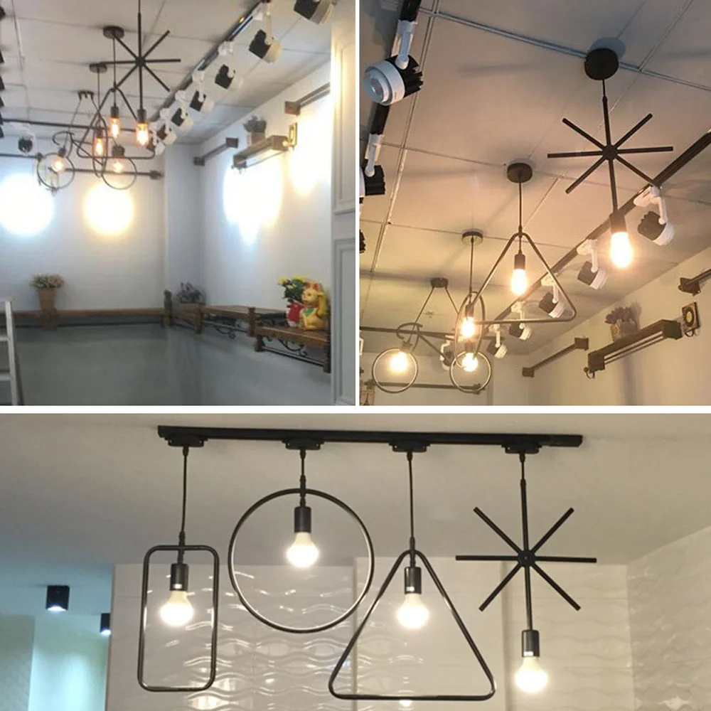 Black fabric cable pendant with round black shade hanging from ceiling.