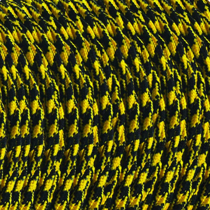 Yellow and black braided vintage twisted lighting cable, 3-core fabric, PVC and copper, in a coil for interior lamp installations