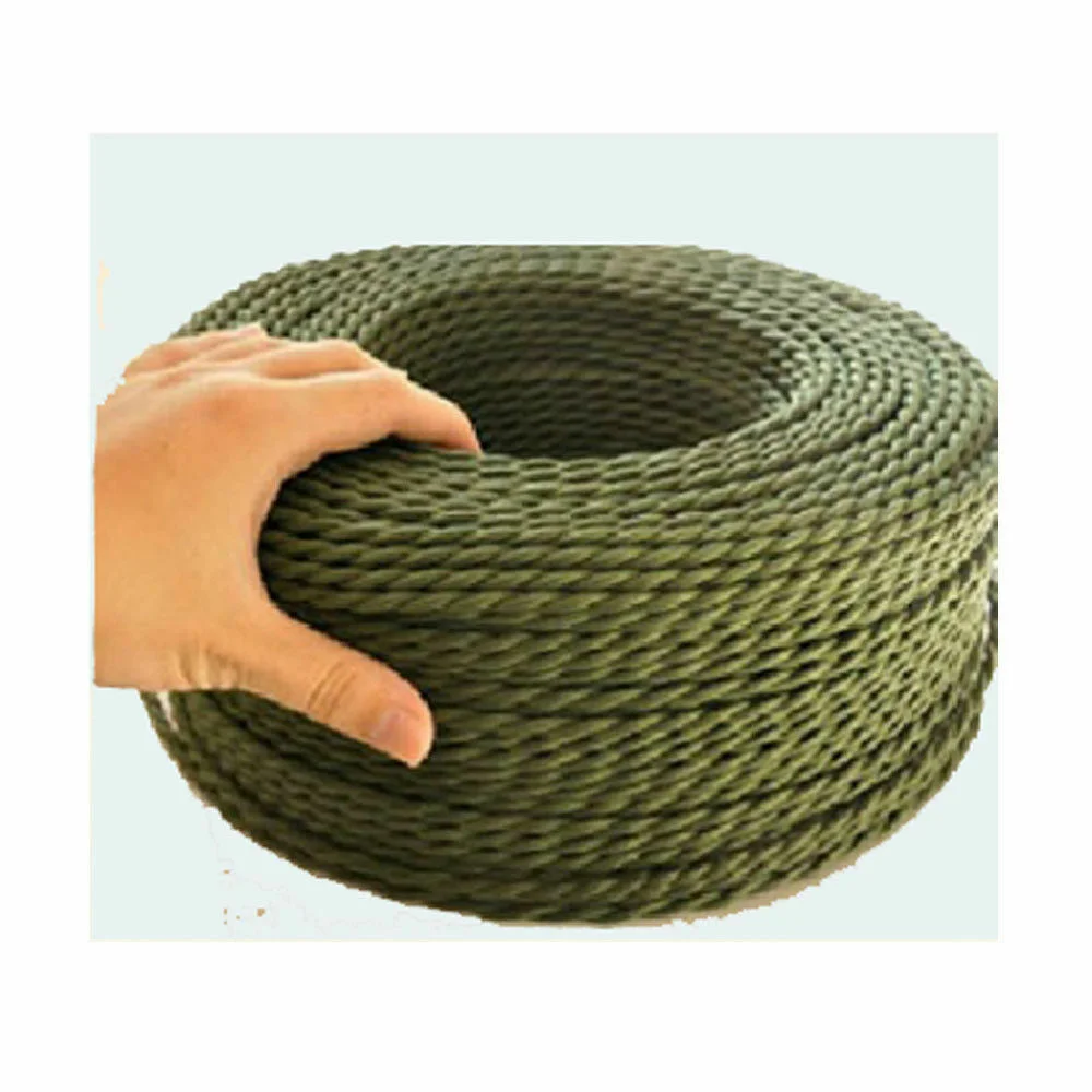 Close‑up of army green vintage braided lighting flex cable, twisted 3‑core with braided fabric wrap and PVC insulation.