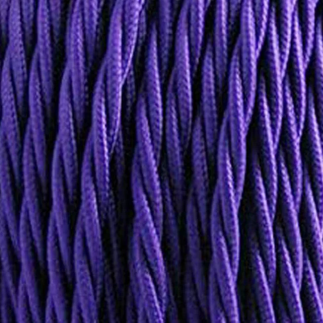 Purple 2‑core twisted fabric cable in a coil, showcasing vintage style and bright fabric sheath