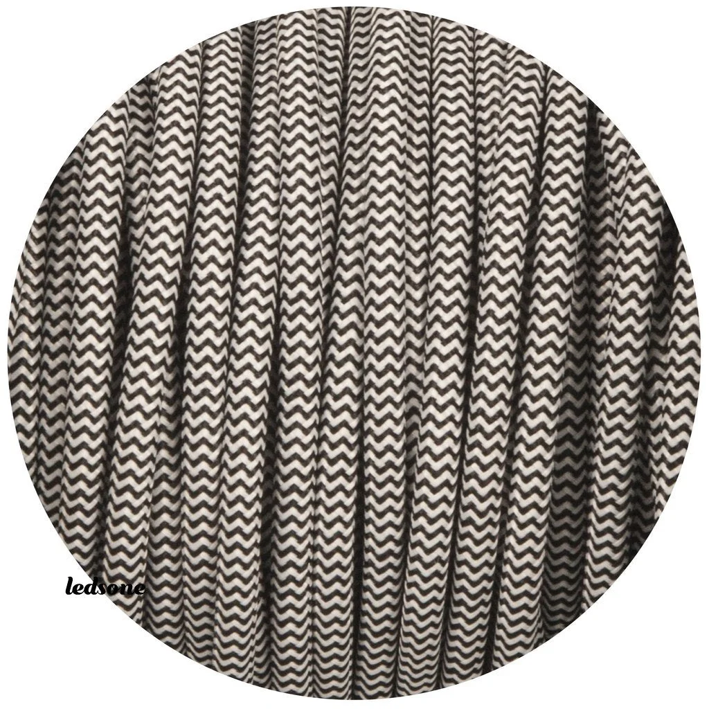 3‑core black‑and‑white braided fabric cable, round, 7mm diameter, shown coiled, vintage style lighting cable.