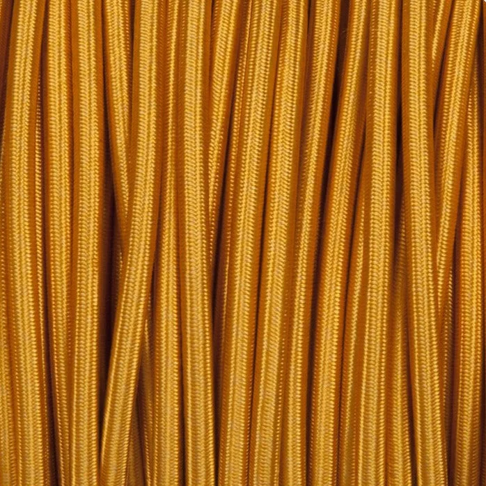 Gold fabric lamp cord: thick, round, braided silk-textile cable with metallic gold finish, showing three cores.