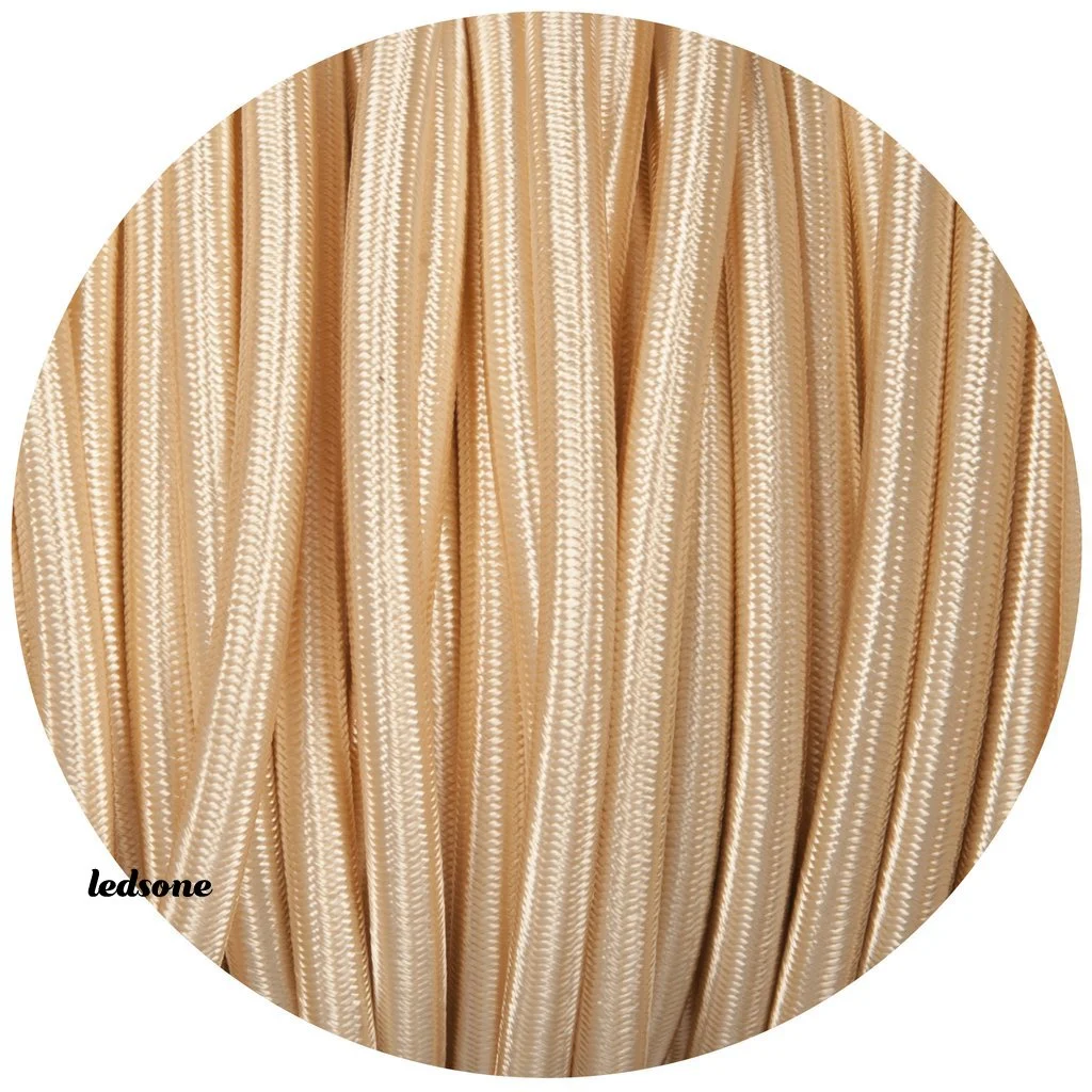 A 5‑meter round light gold cable flex, double‑core, covered in high‑quality fabric – ideal indoor fabric cable flex.