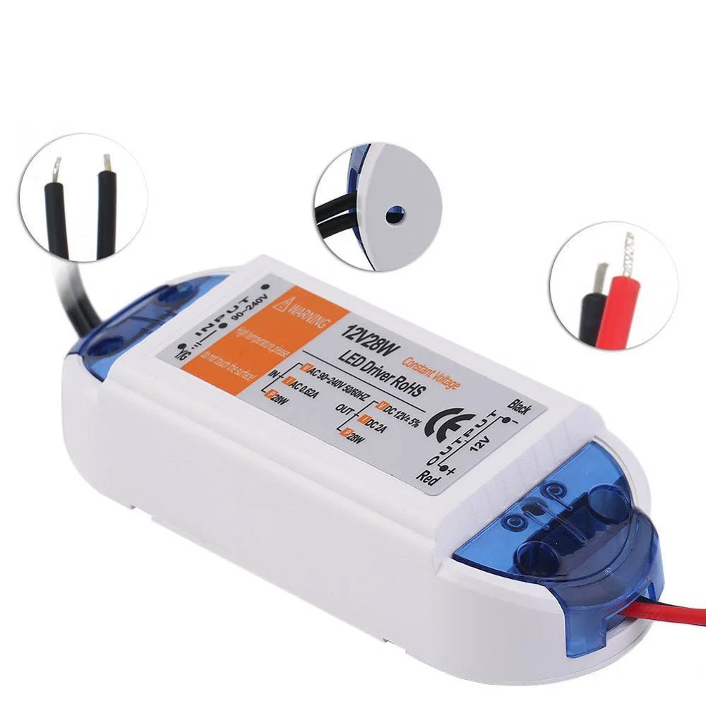 Compact 28W LED transformer in plastic housing, rectangular shape, labeled 12V output and 28W power, with mounting holes
