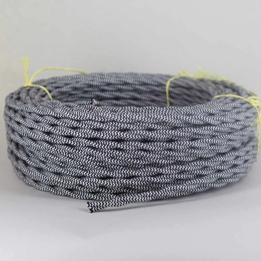 Black and white vintage braided cable roll with twisted fabric, PVC insulation and copper core, 2‑core wiring.