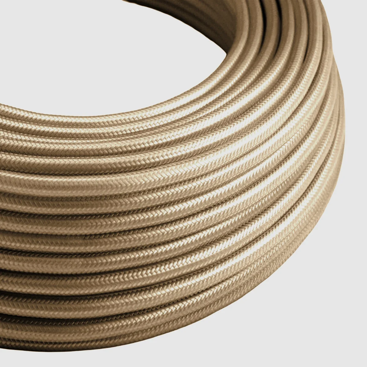 Cream vintage braided lamp cord, 2‑core round cable, 6mm diameter, fabric‑finished, shown in a short segment.
