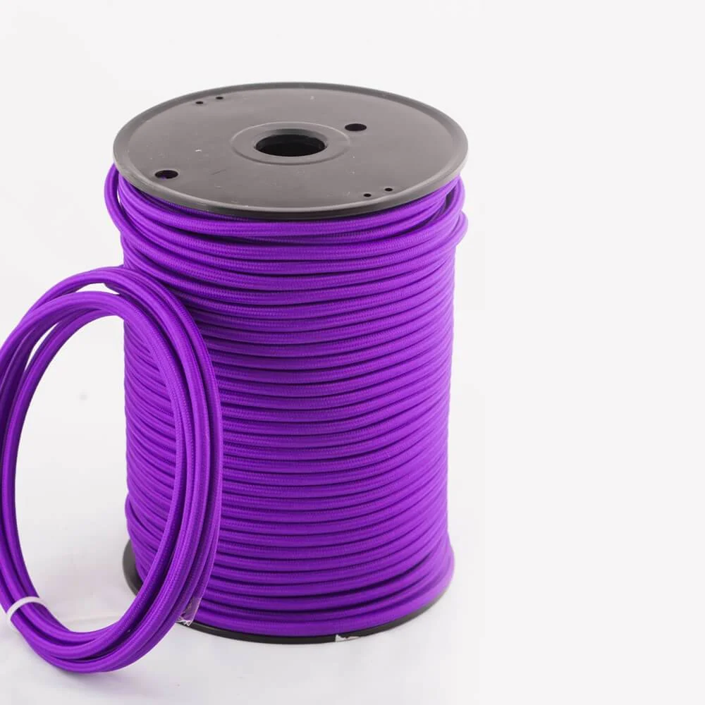 Purple, round braided fabric cord cable with visible two cores, 6mm diameter, 1m length, displayed on a wooden surface