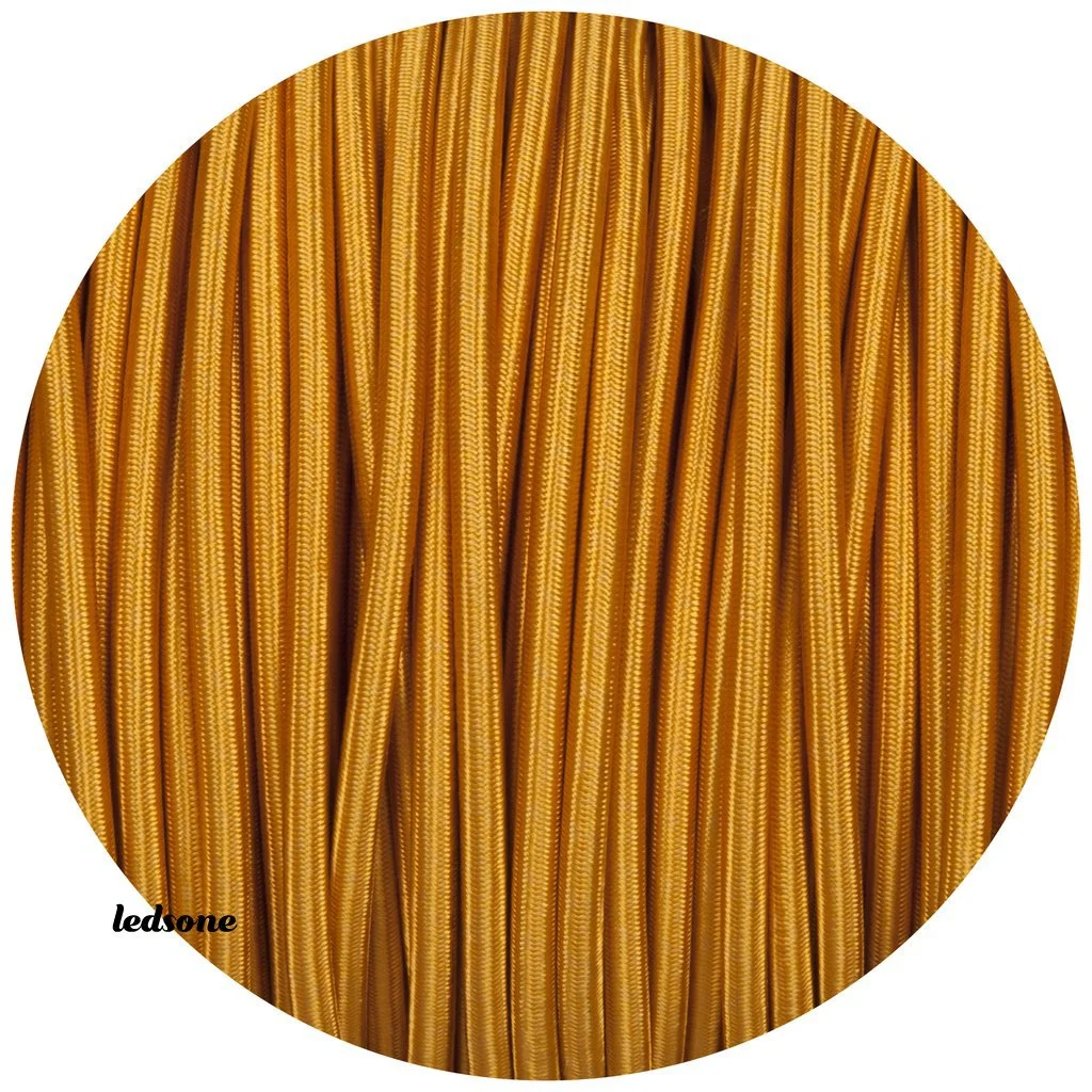 2‑core round gold fabric cable with braided exterior, flexible and thick 6mm diameter, suitable for indoor lighting.