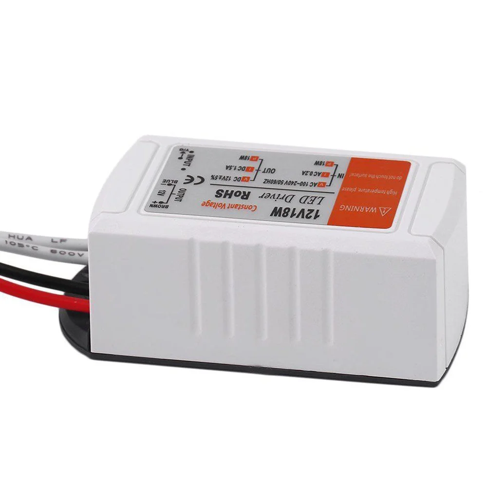 Compact 12V LED driver in flame‑retardant ABS plastic, 60×35×25mm, with single input socket and metal power terminals.