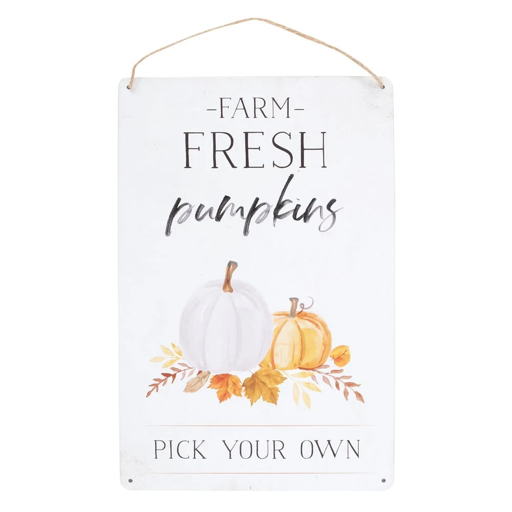 Metal hanging sign with painted pumpkins, autumn leaves, and text "Farm Fresh Pumpkins - Pick Your Own
