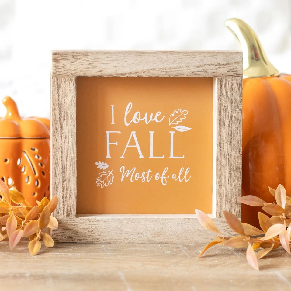 Square autumn wooden sign with orange "I Love Fall Most of All" text and unfinished wooden frame with hanger on back