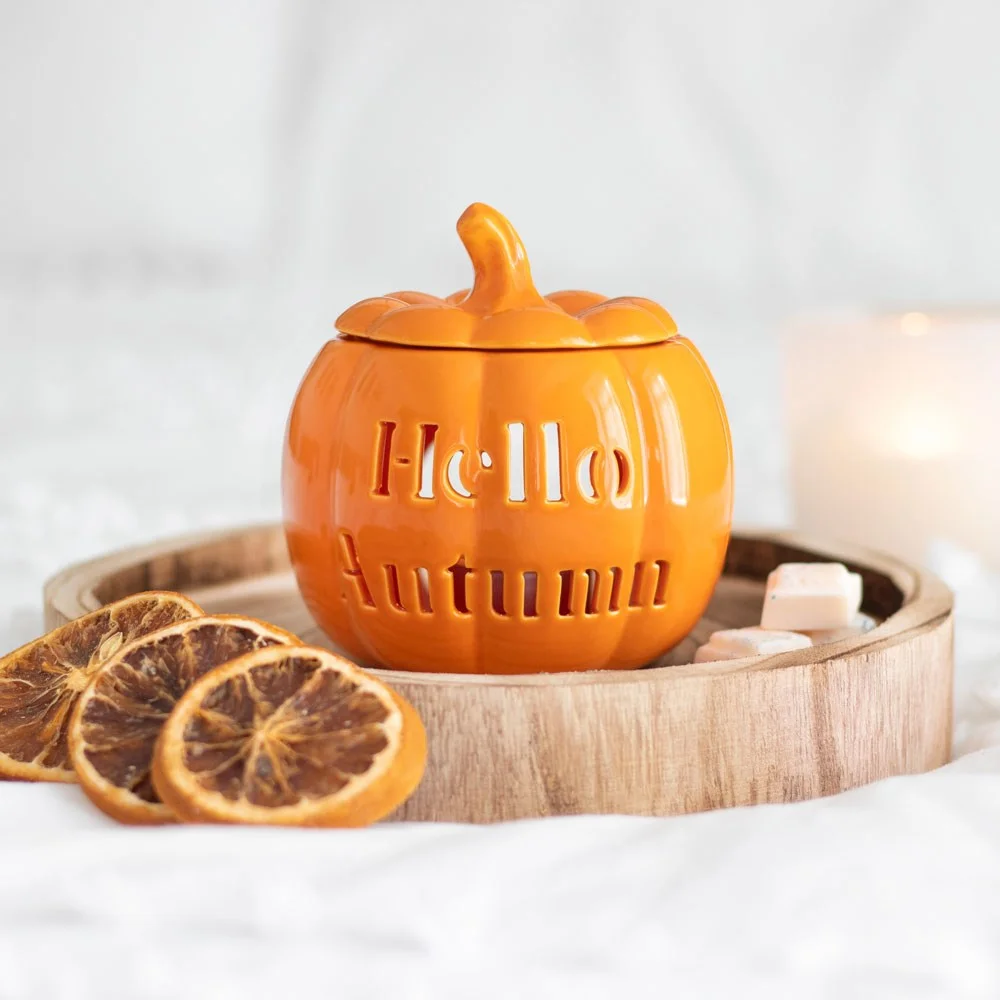 Ceramic pumpkin-shaped autumn oil burner with cut-out 'Hello Autumn' text, 11.5cm tall, for wax melts and oils
