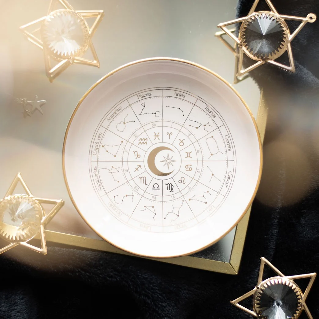 Off-white astrology trinket dish with gold effect astrology wheel design, ideal for jewellery and small items storage