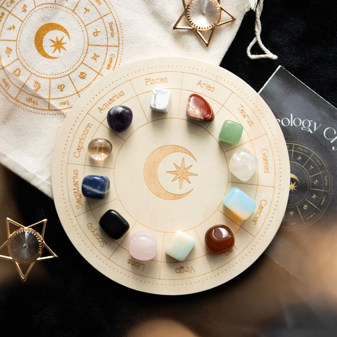Wooden astrology crystal grid with 12 zodiac crystals arranged in a circle, including instruction booklet and storage bag