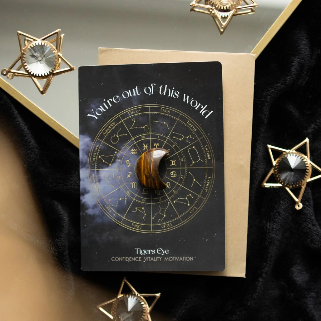 Astrology wheel design Tiger's Eye greeting card with crescent moon crystal and matching envelope on white background
