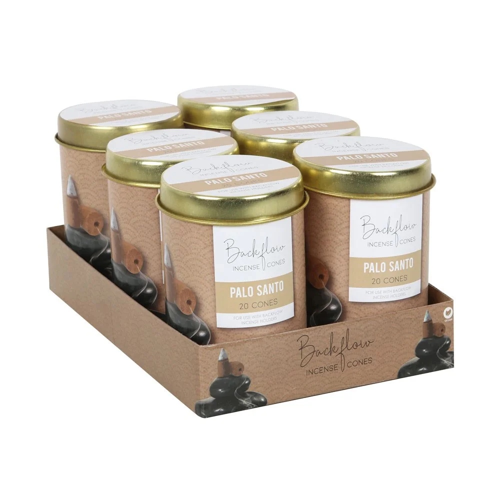 Six tins of Elements Palo Santo incense cones in a cardboard tray, each tin containing 20 jumbo backflow cones