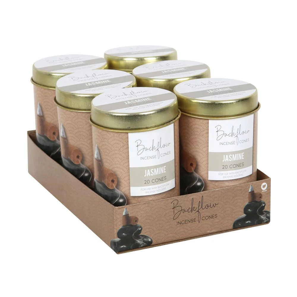 Six tins of Elements jasmine backflow incense cones arranged on a cardboard tray with floral design packaging