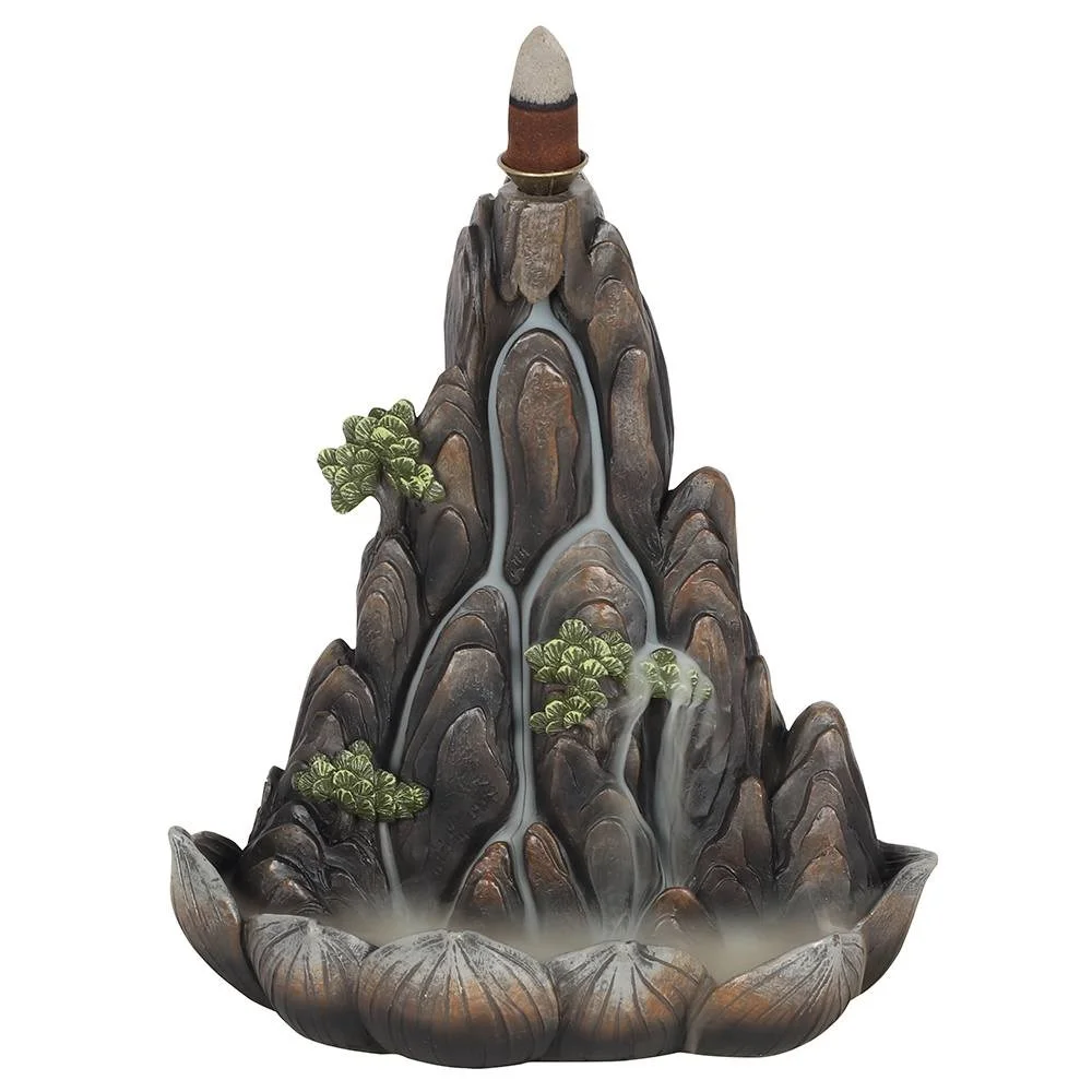 Bronze backflow incense burner shaped like a mountain with bonsai trees and a petal-shaped smoke catcher dish