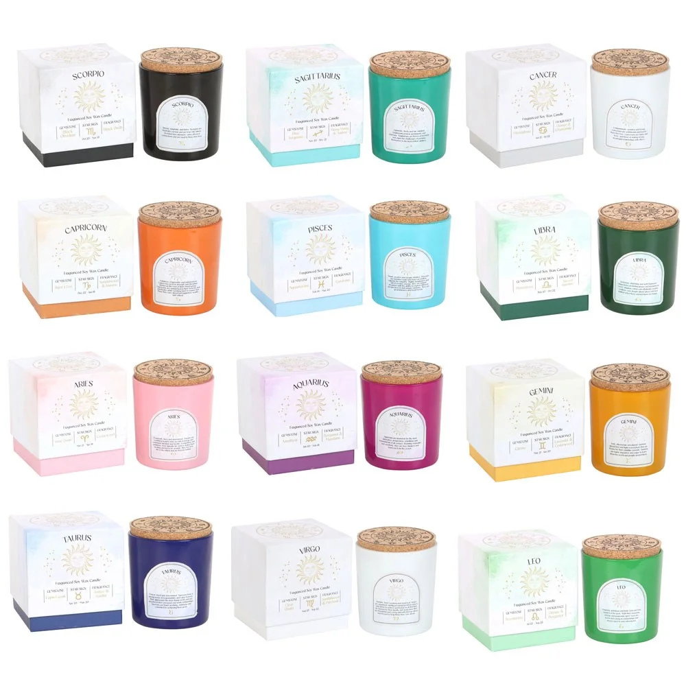 Set of 12 zodiac gemstone candles in a sliding box, each with crystal chips representing star signs and fragrances