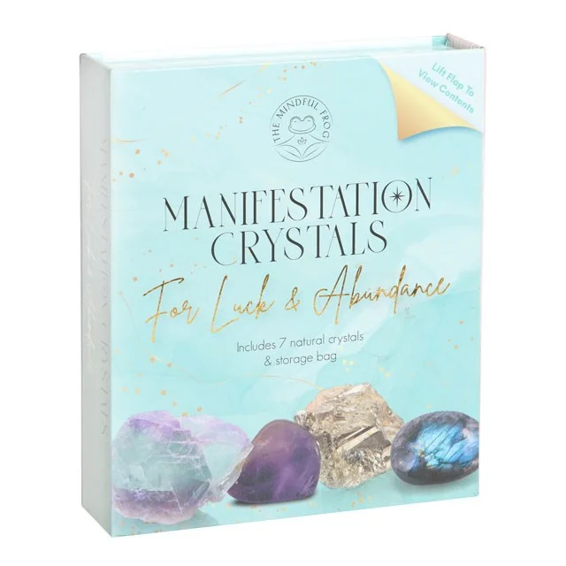 Manifestation crystal gift set with seven natural stones and a faux leather bag displayed in an open gift box