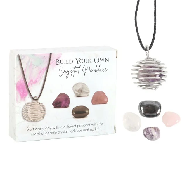 Crystal necklace kit with 4 tumblestones including amethyst, rose quartz, clear quartz, hematite, and a spiral cage necklace