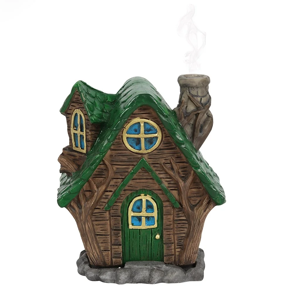 Incense cone house shaped burner, tiny house silhouette with chimney, ready to place an incense cone.