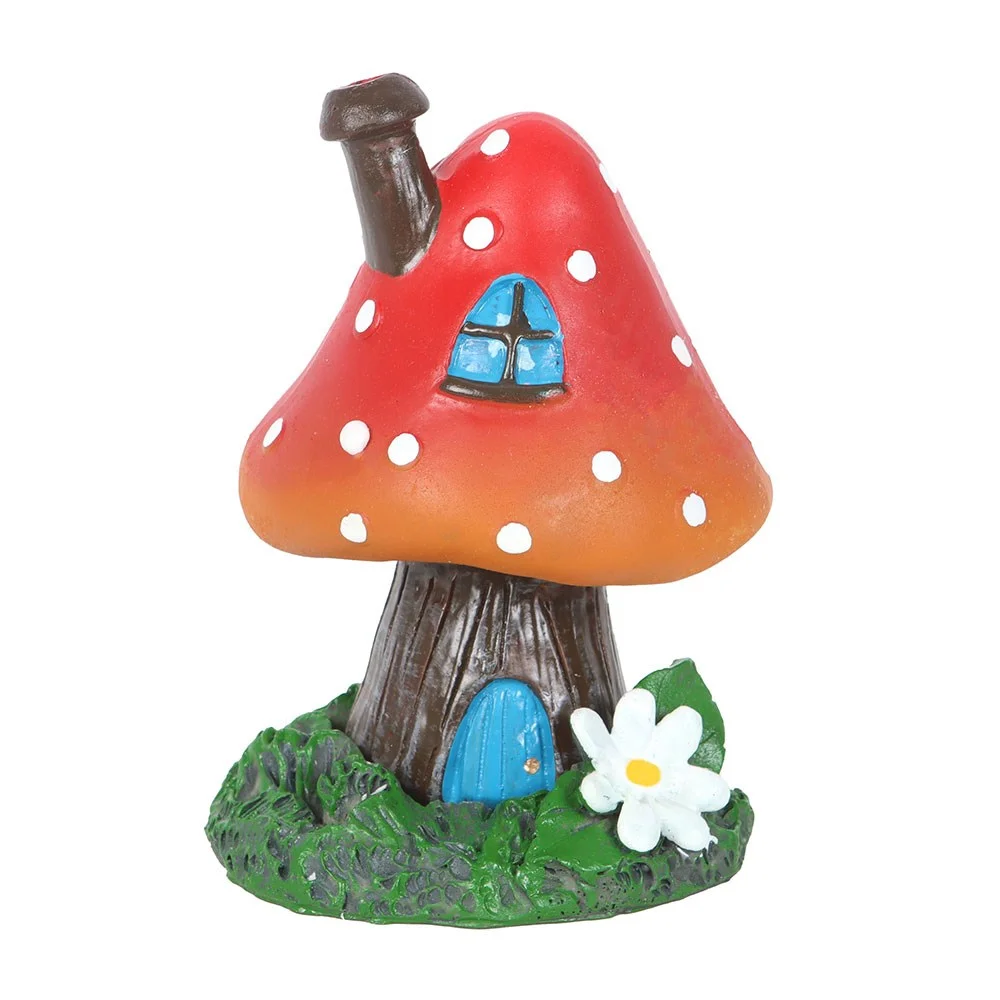 Bright red toadstool incense holder with chimney, showing cone burning and rising smoke, designed by Lisa Parker.