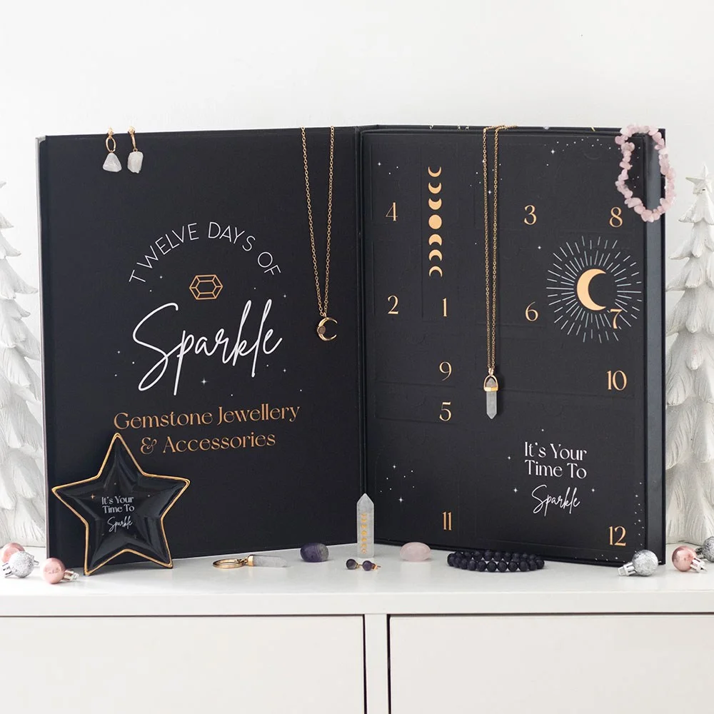 12-day crystal jewellery advent calendar with amethyst, rose quartz, clear quartz pieces in decorative box with trinket dish