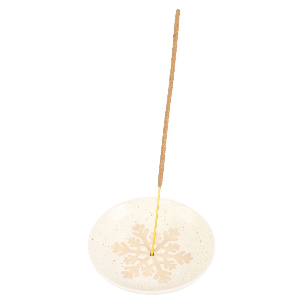 Speckled off-white snowflake incense holder catching ash from a lit festive incense stick on a white background