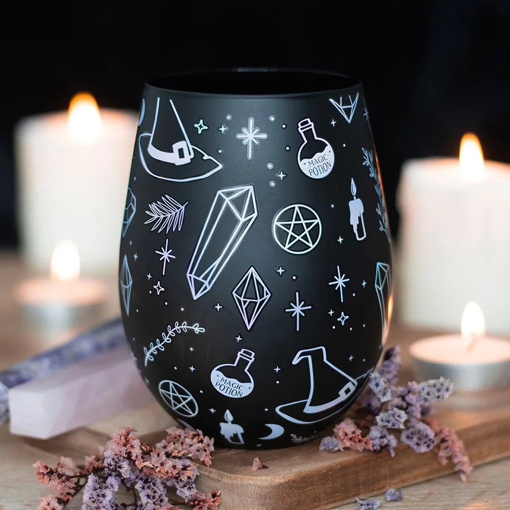 Black crystal design on a 550ml witch print stemless glass with a curved shape on white background