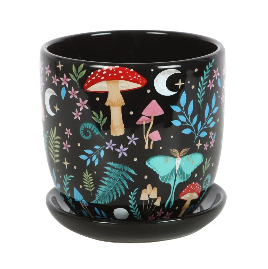 Ceramic plant pot with dark forest print, colourful flora, fauna, moon and star motifs, matched saucer