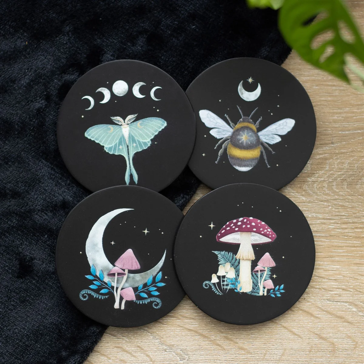Dark forest coaster set with mushroom landscape, luna moth, crescent moon, and bumblebee under stars, set of 4 coasters