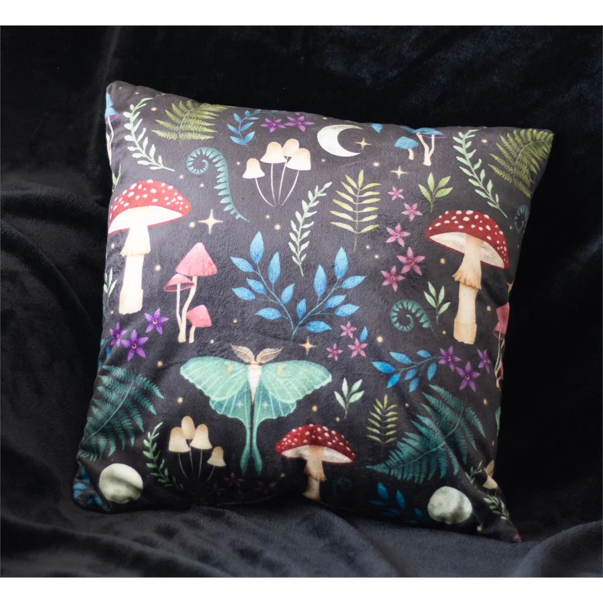 35cm square dark forest cushion with velvety fabric featuring mushrooms and moths in rich forest colors