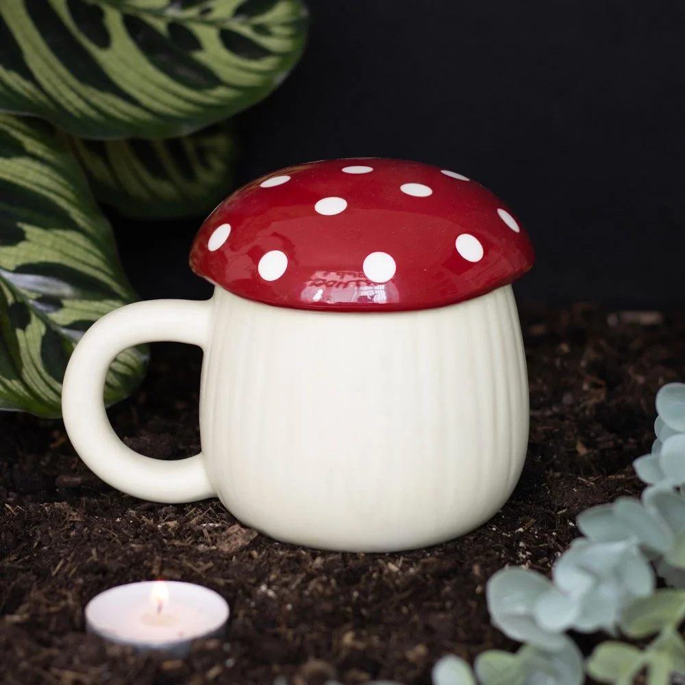 White ceramic mushroom shaped mug with red cap and white spots, 380ml capacity, hand wash only.
