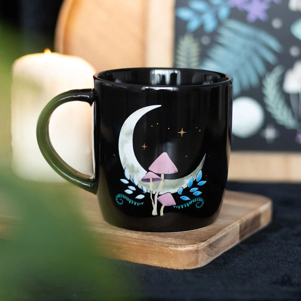 Black forest moon ceramic mug with intricate toadstool, stars, flora, and fauna design, 340ml capacity