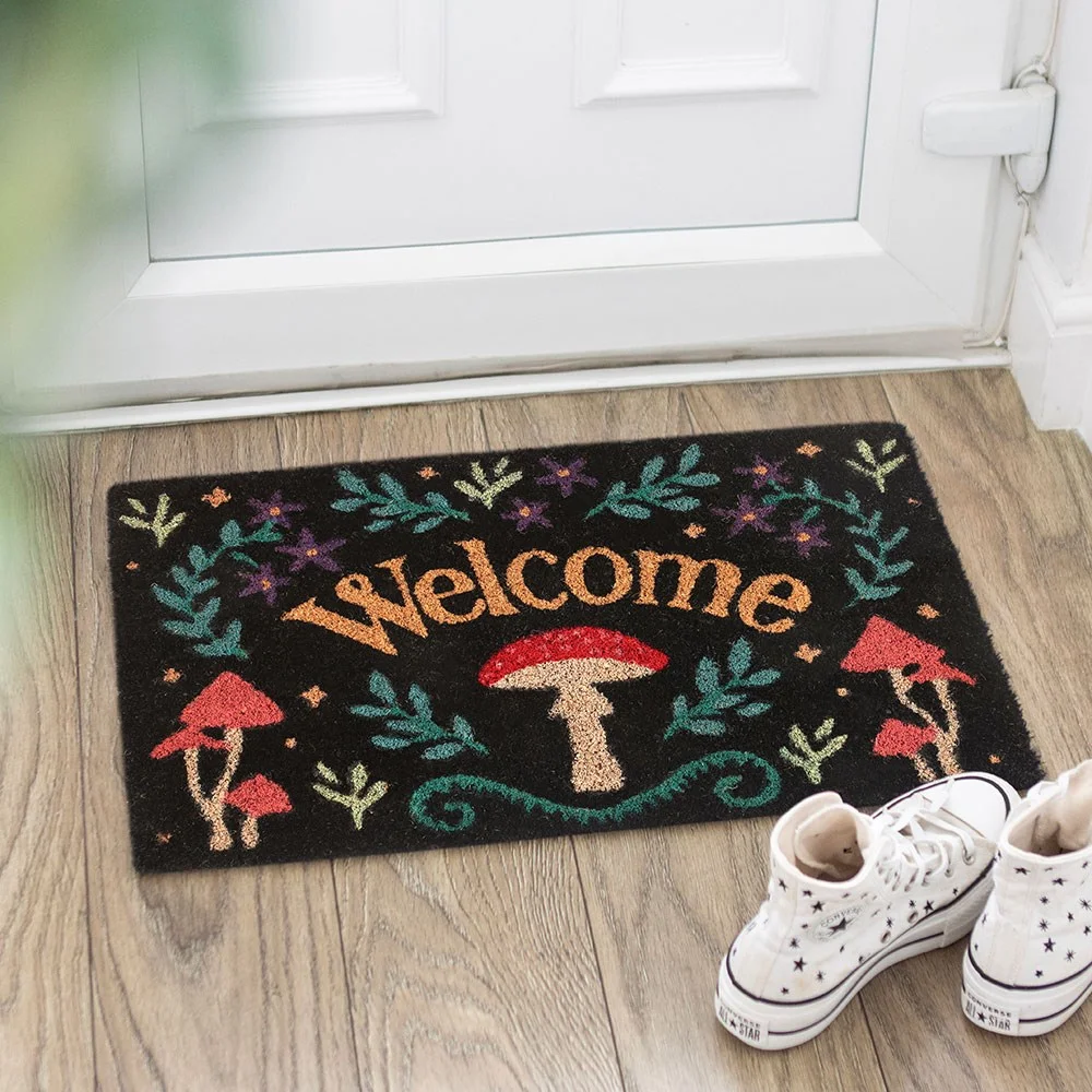 Black mushroom doormat with forest design and 'Welcome' text, bright green mushrooms on black background, indoor safe only.