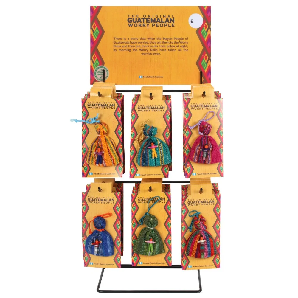 Set of 36 colourful worry dolls arranged on a wooden display stand, showcasing various traditional designs