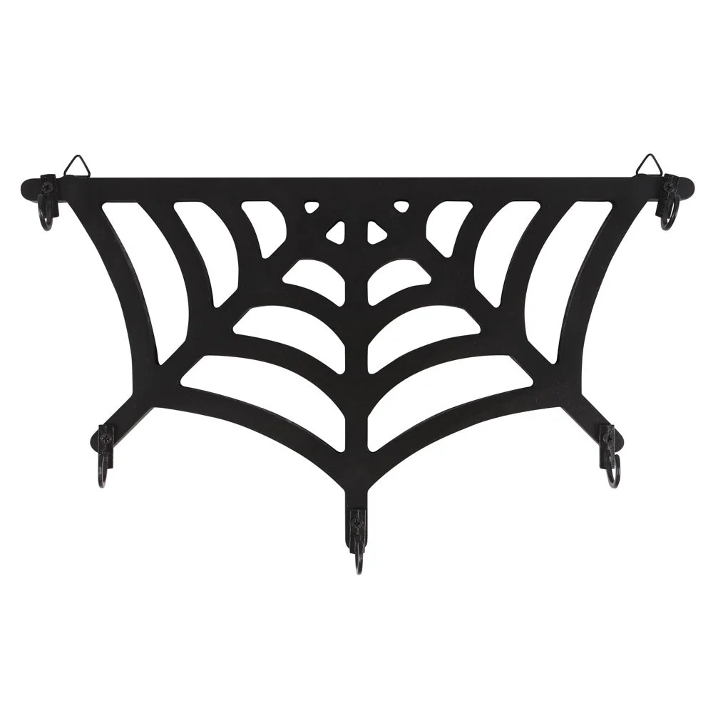 Black metal spiderweb key hook mounted on wall with two triangle hooks for hanging keys and small items