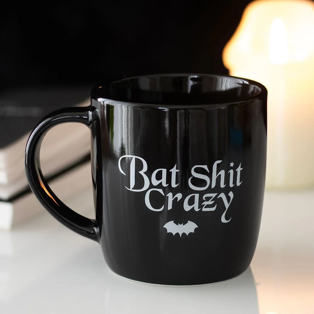 White ceramic funny bat mug with "Bat Shit Crazy" text in black, 340ml capacity, microwave and dishwasher safe