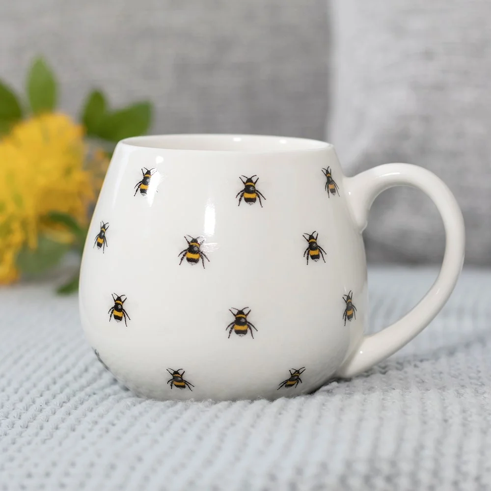 White rounded bee print mug made from New Bone China, microwave and dishwasher safe, 9cm tall, 14cm wide