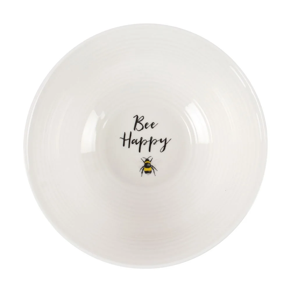 White ceramic breakfast bowl with ridged texture and "Bee Happy" text, 17cm wide, dishwasher and microwave safe
