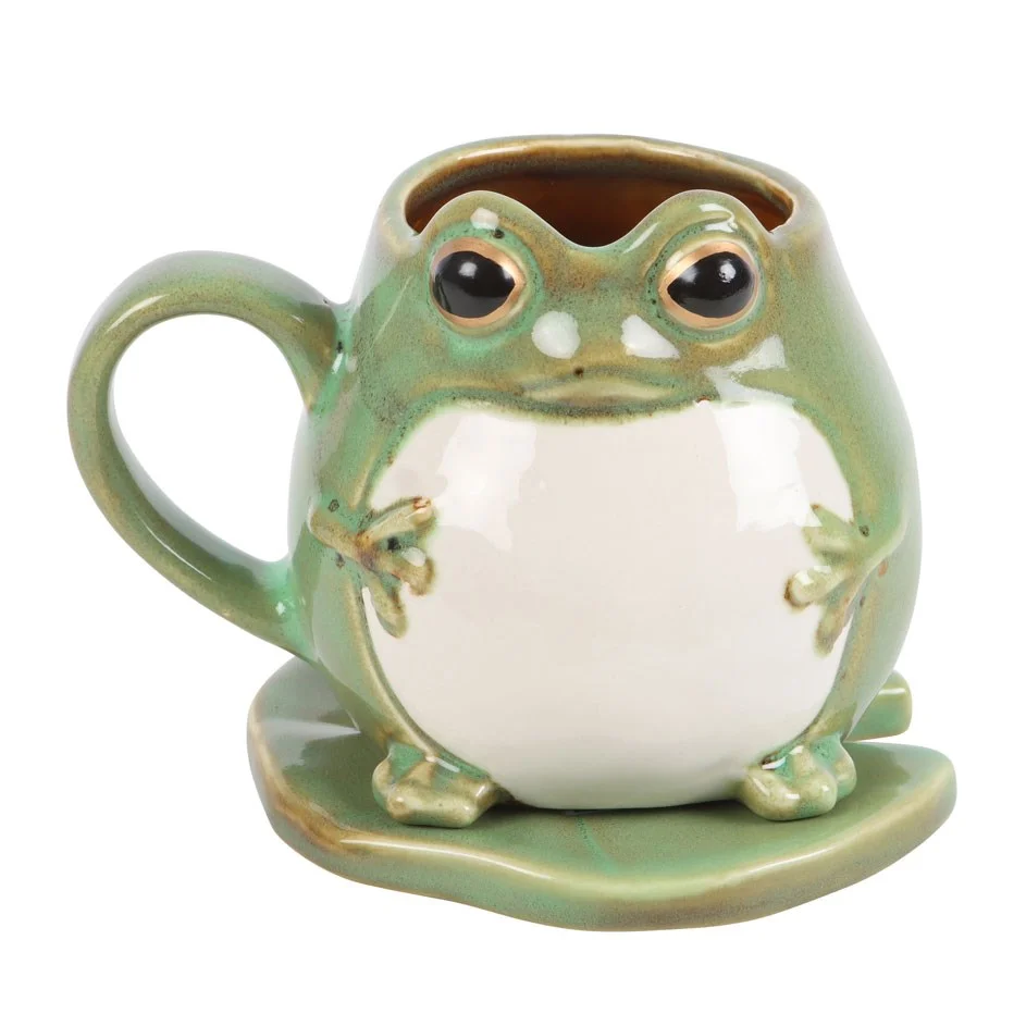 Frog shaped mug with matching lily pad saucer, whimsical design for tea or coffee