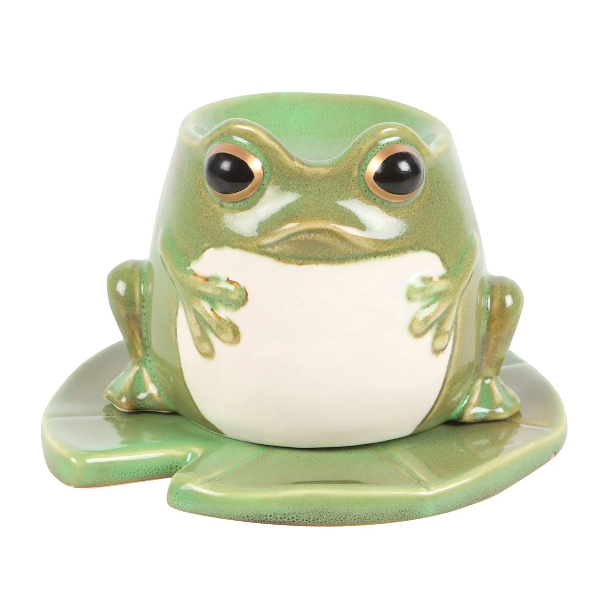 Quirky frog oil burner on lily pad plate, fragrant oil light for a whimsical home.