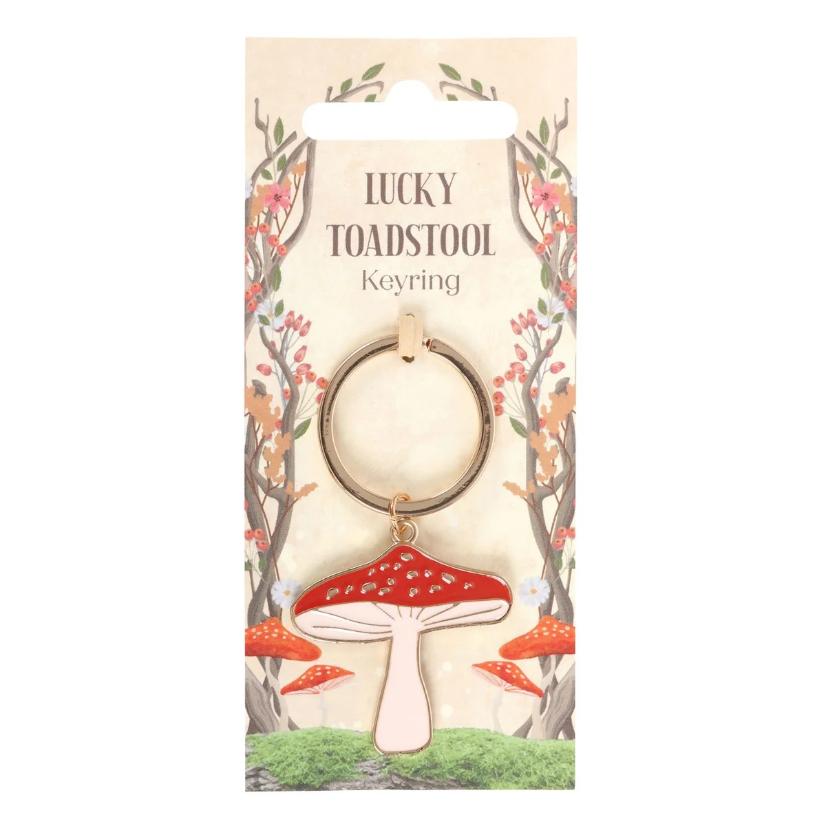 Adorable toadstool keyring on forest-themed backing card, a charming gift for mushroom lovers