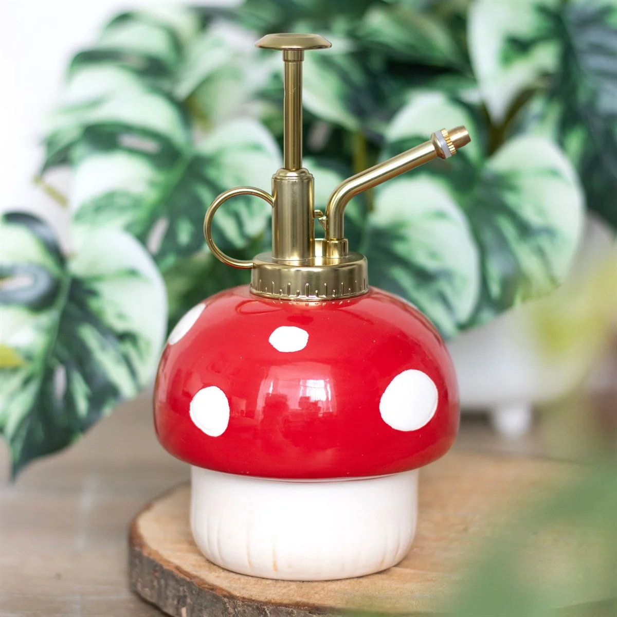 Mushroom plant mister with a whimsical, cottagecore design for indoor plant care and decorative use